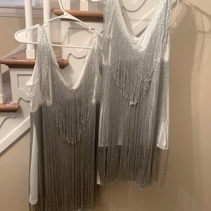 Silver fringe dresses.